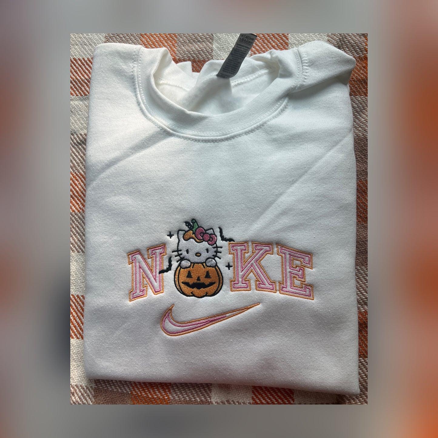 Swoosh kitty in 🎃
